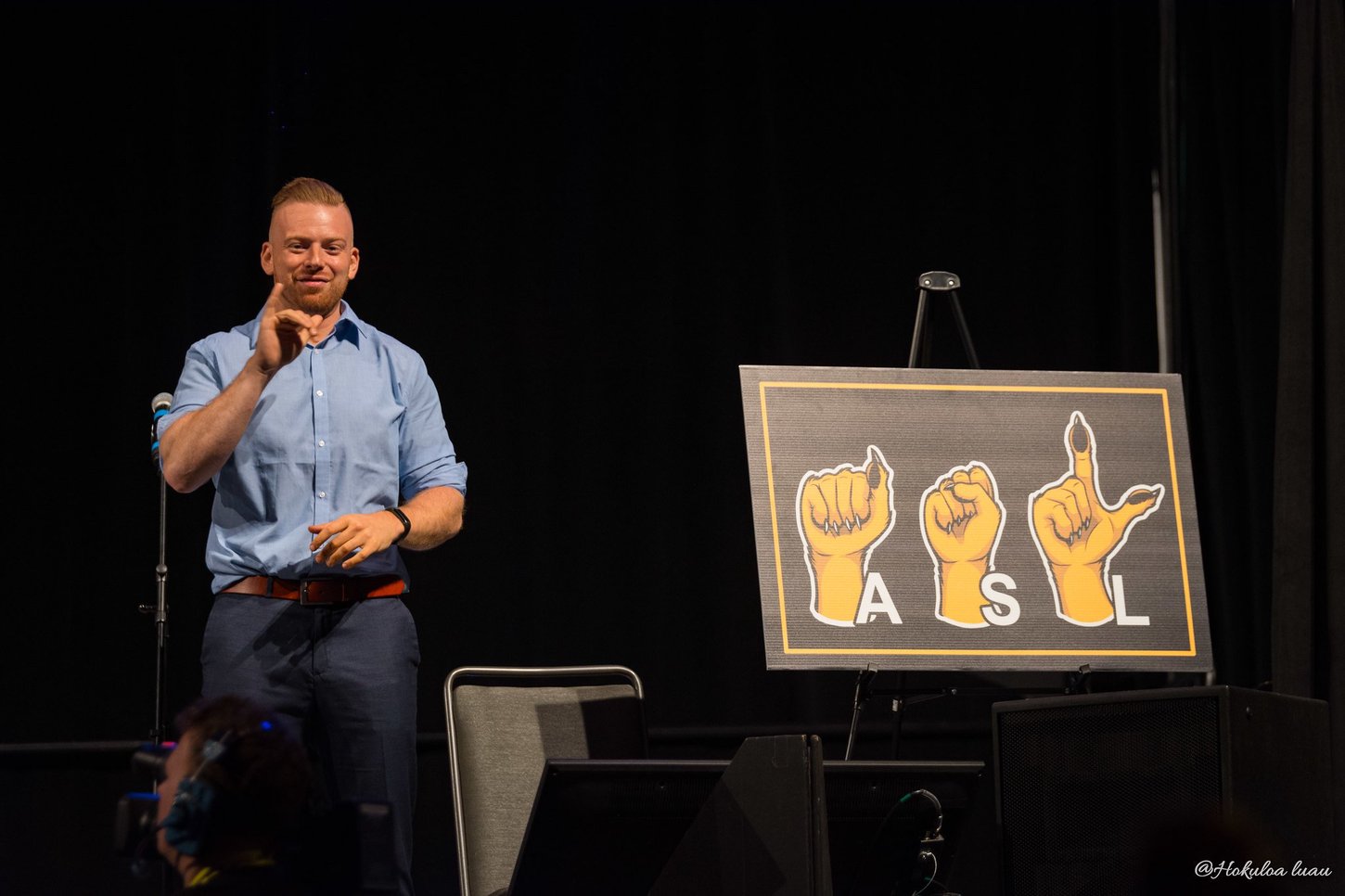 An American Sign Language Interpreter, or an "Interpre-fur", helping to sign for a Main Stage event at Anthrocon.